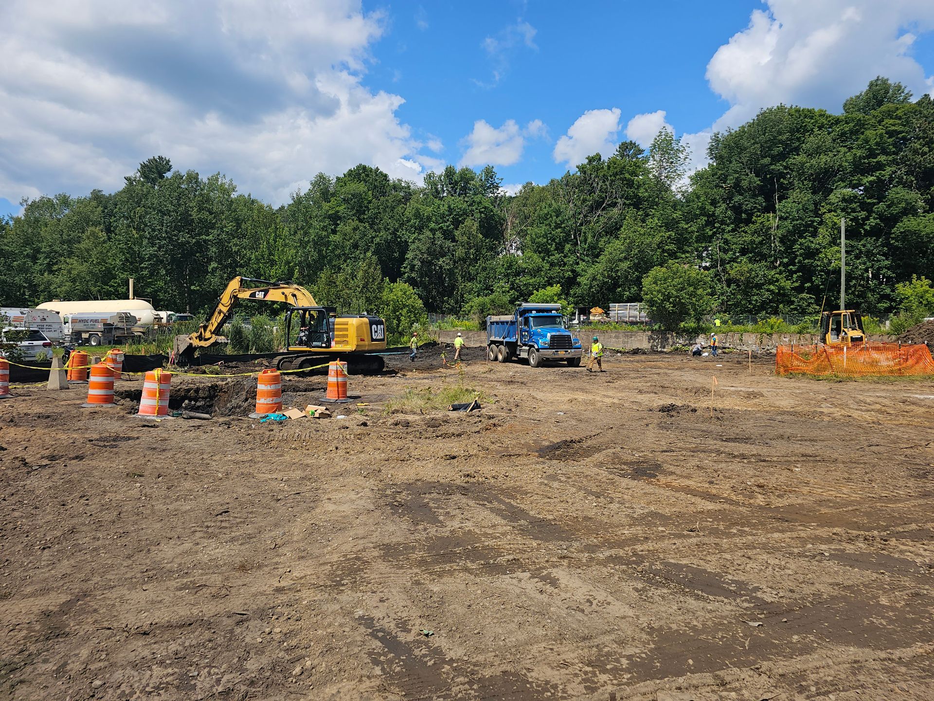 MP Environmental Services equipment and workers at the Saranac Loft remediation site 