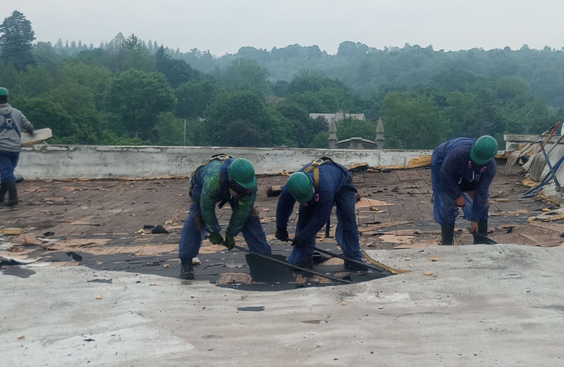 MP Environmental employees performing remediation and restoration services on a commercial building