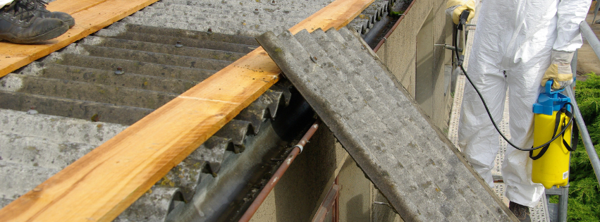 Asbestos being removed from a building by an MP Environmental Services employee