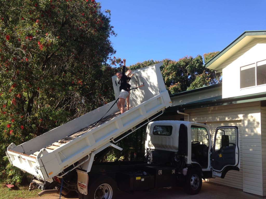 Two Girls On Trailer Truck — Masonry Construction in Sunshine Coast, QLD