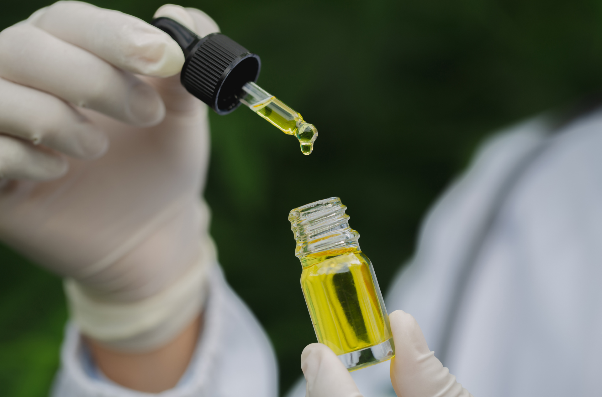 Photo of a cannabis oil bottle and dropper