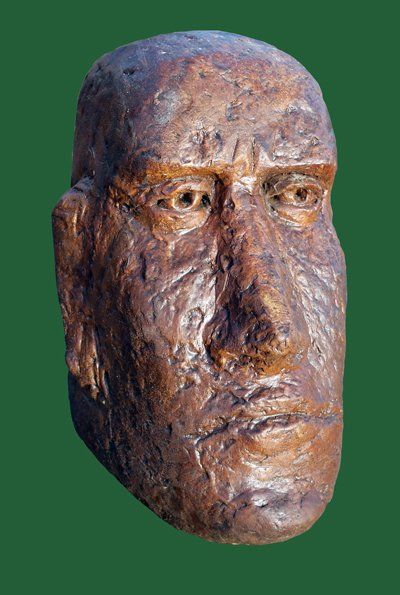 stone garden statue small moai head