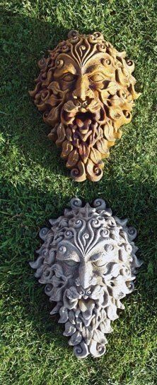 stone garden statue green man plaque