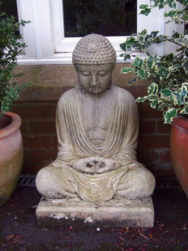 stone garden statue meditating buddha