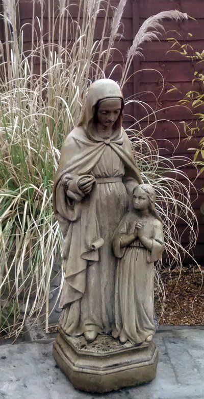 stone garden statue mother child