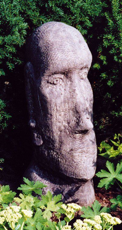 stone garden statue easter island head