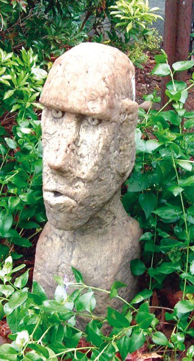 stone garden statue rapa nui head