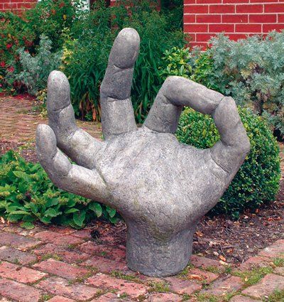 stone garden statue ok hand