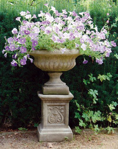 stone garden statue emblem plinth