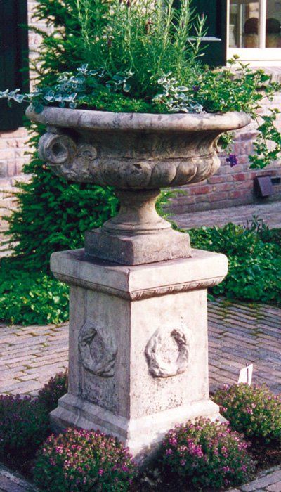 stone garden statue laurel plinth