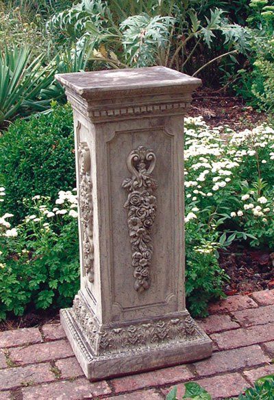 stone garden statue floral plinth