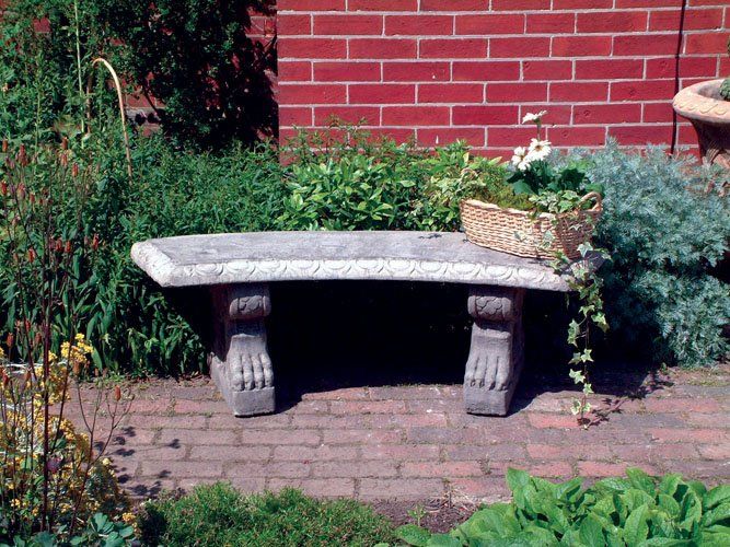 stone garden statue curved patterned bench top