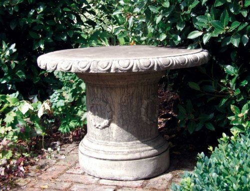 stone garden statue laurel table