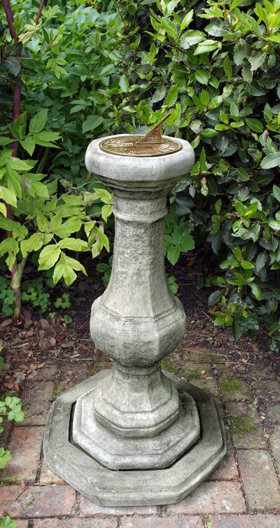stone garden statue pedestal aged brass sundial