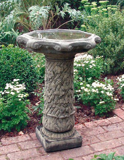stone garden statue vine birdbath