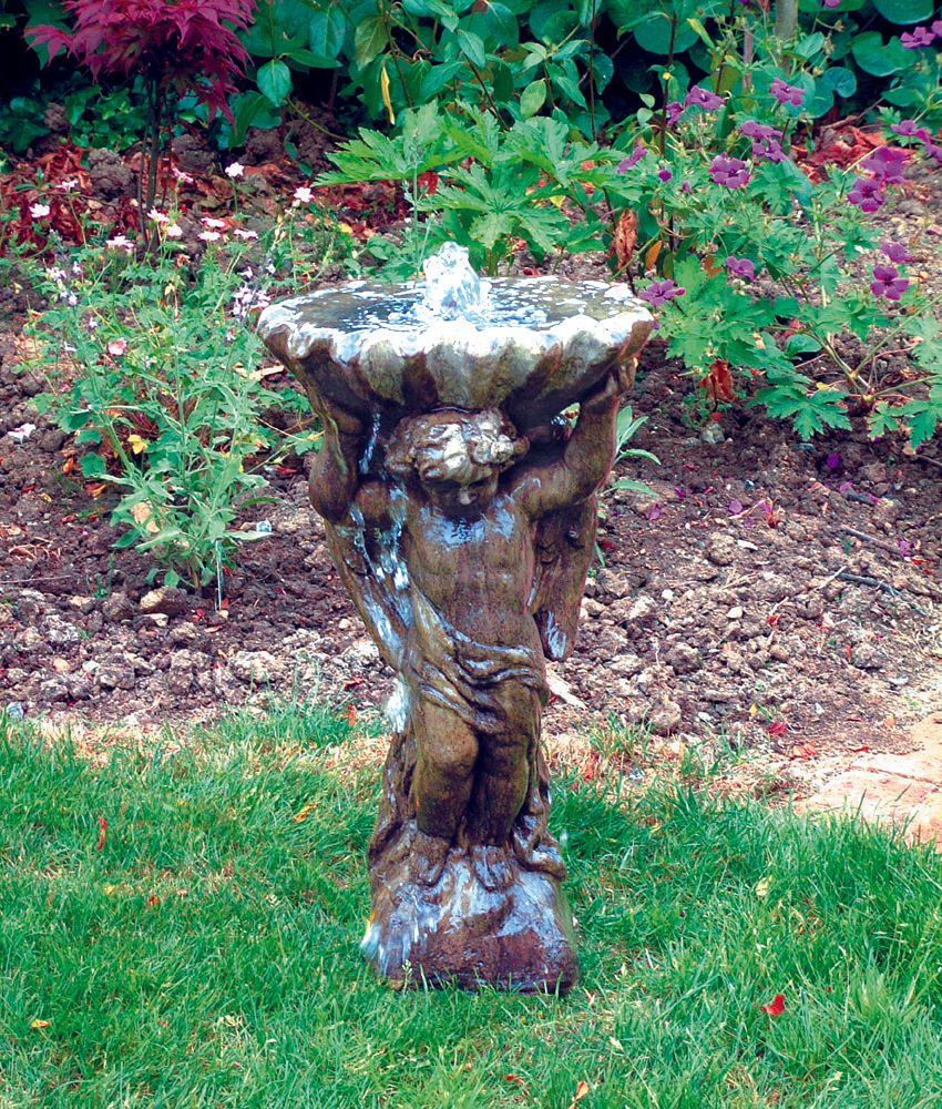 stone garden statue angel with shell fountain