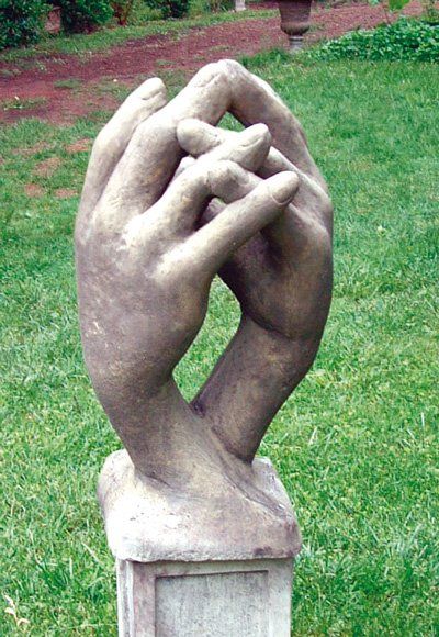stone garden statue entwined hands
