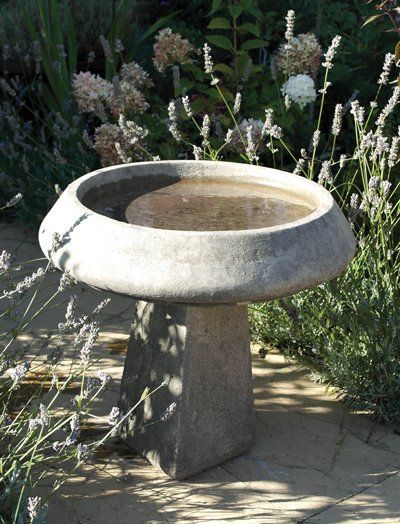 stone garden statue pure and simple birdbath
