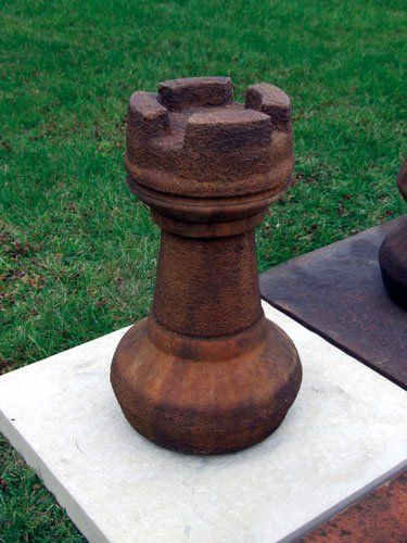 stone garden statue rook rust chess