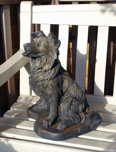 stone garden statue collie pup