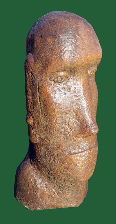 stone garden statue easter island head