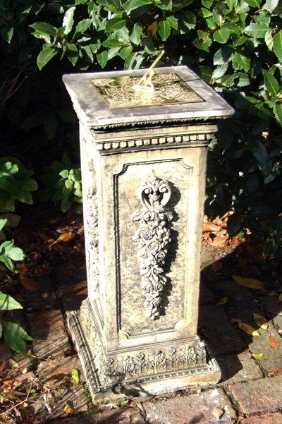 stone garden statue floral brass sundial