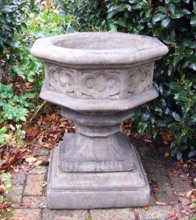 stone garden statue gothic font