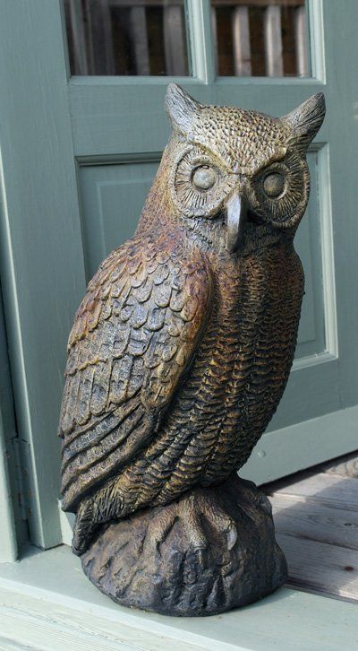 stone garden statue great horned owl