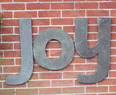 stone garden statue letters joy j o y