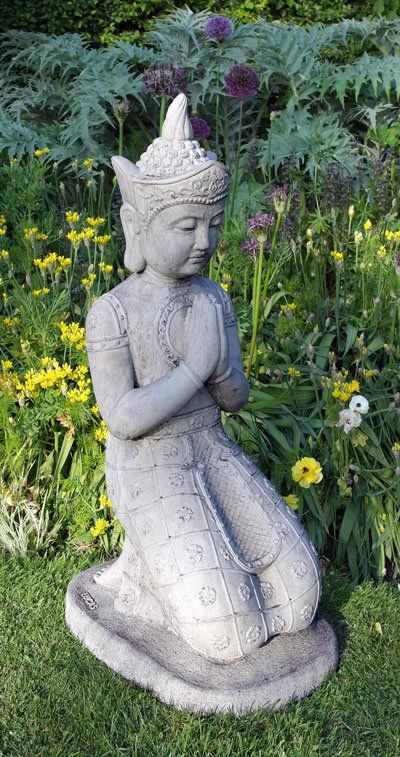 stone garden statue kneeling buddha