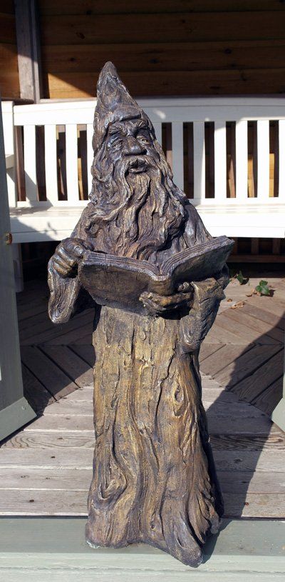 stone garden statue merlin wizard
