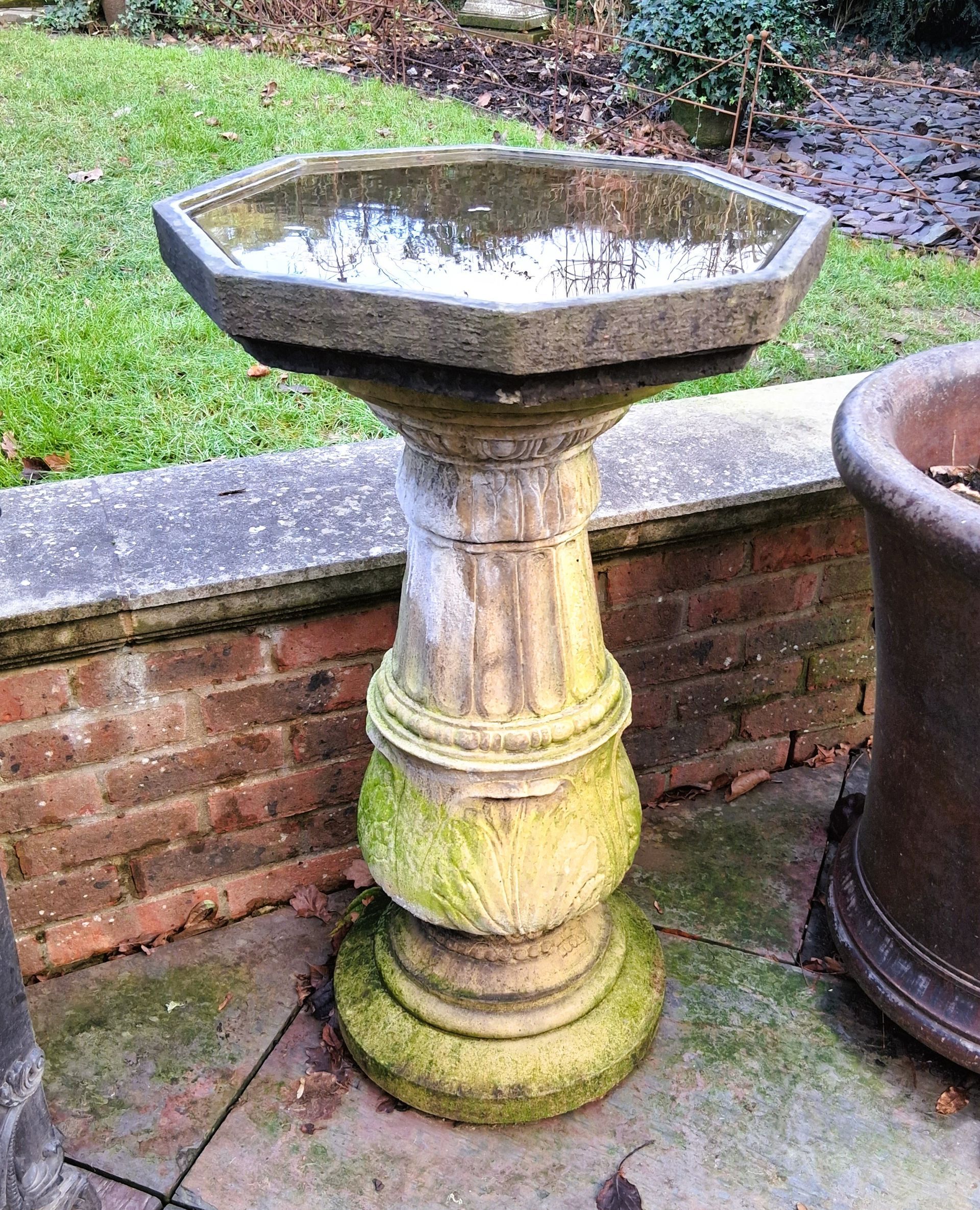 ornate birdbath water feature stone garden statue