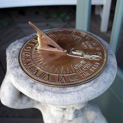 stone garden statue sundial round brass dial