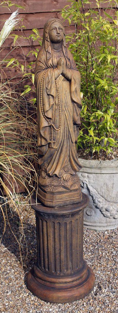 stone garden statue the novice