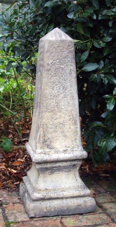 stone garden statue obelisk