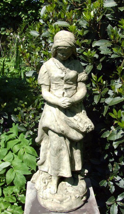 stone garden statue peasant girl