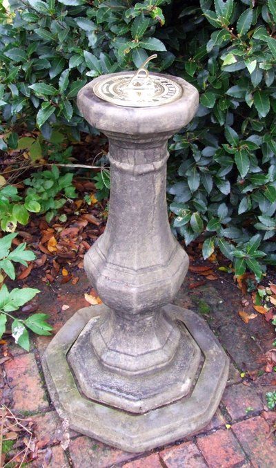 stone garden statue pedestal brass sundial
