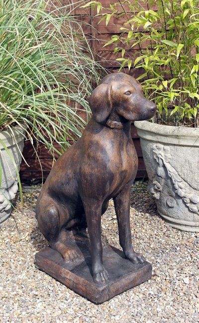 stone garden statue pointer