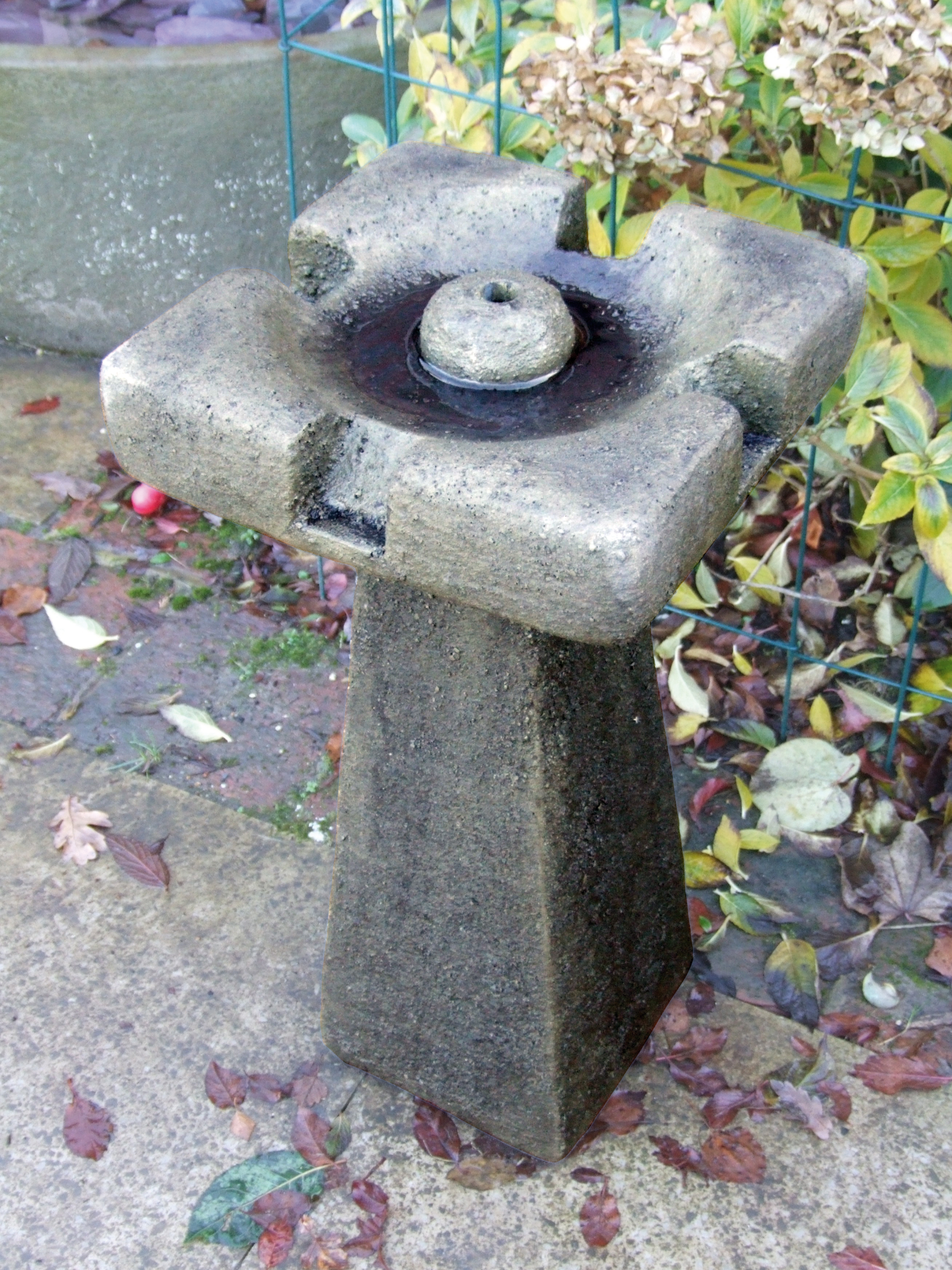 simple water fountain stone garden statue