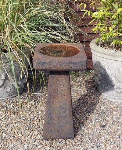 stone garden statue simple birdbath