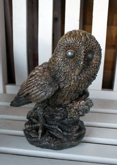 stone garden statue tawny owl