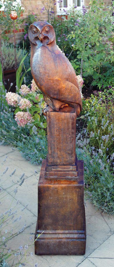 stone garden statue owl