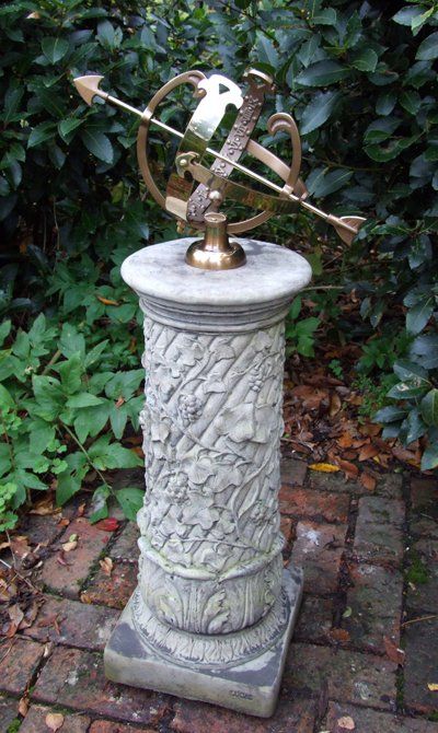 stone garden statue vine armillary