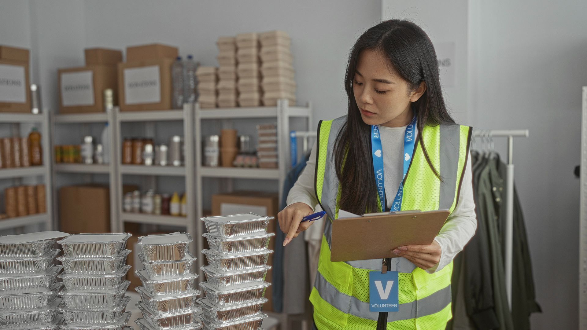 Woman organizing food supplies.