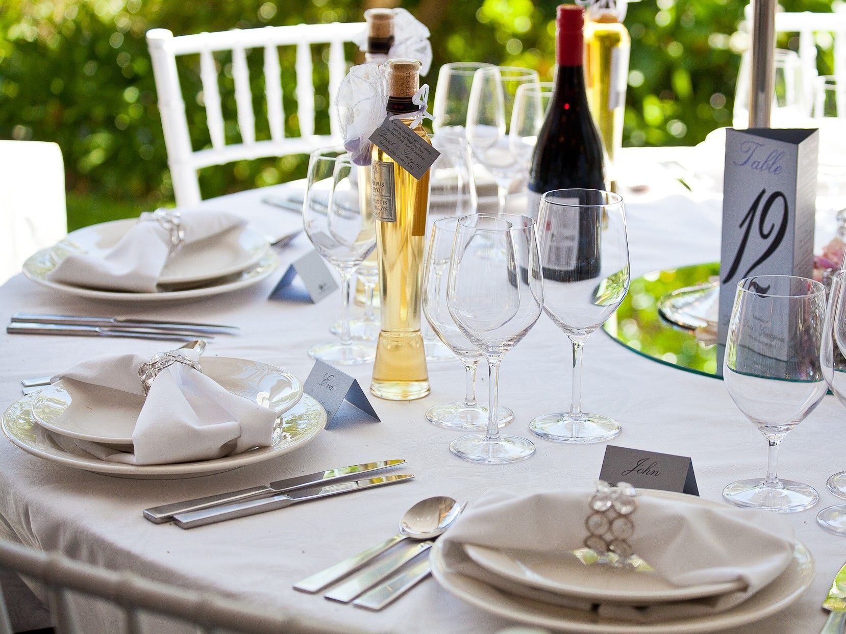A bunch of plates with potatoes on them on a table