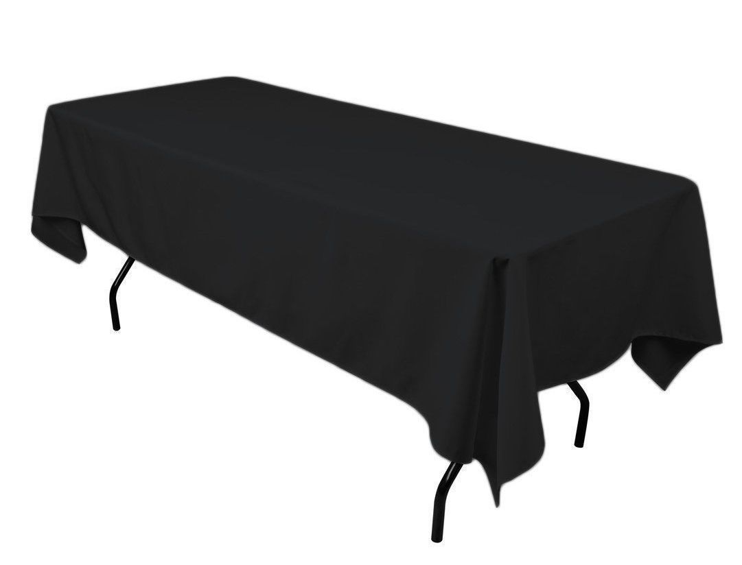 A long table with a black table cloth on it