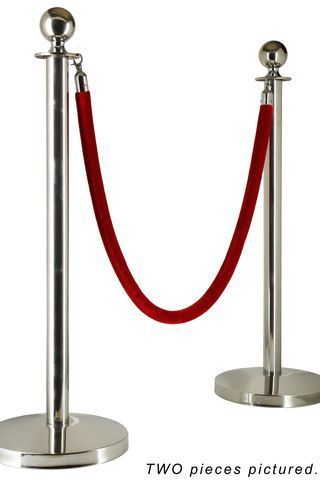 A silver pole with a red rope attached to it