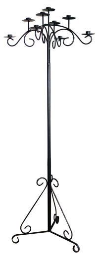 A black wrought iron candelabra with candles on it