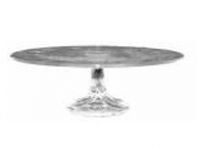 A silver cake stand with a clear base on a white background.