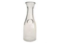 A clear glass bottle with a handle on a white background.